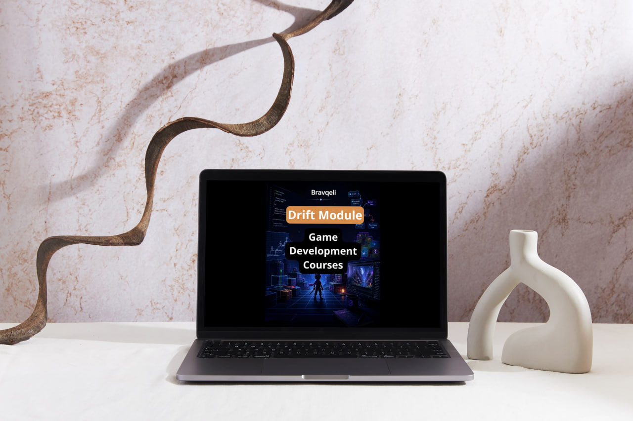Laptop displaying a game development course on a decorative surface with a marble wall background
